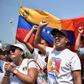 Venezuelans protest against the government of President Nicolas Maduro at a border bridge in Cucuta, Colombia