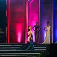 Female contestants sashayed across the stage in Yangon in front of thousands, displaying an array of kaleidoscopic costumes