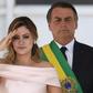 Brazilian authorities are to scrutinize the bank accounts of First Lady Michelle Bolsonaro (L) as part of a growing scandal over suspect payments involving the president's politician son
