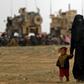 Civilians flee the Islamic State's group crumbling last holdout of Baghouz in eastern Syria