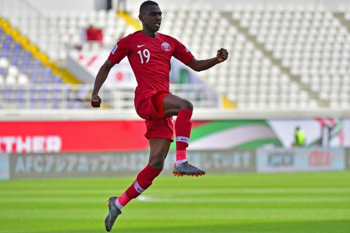 Qatar's Almoez Ali celebrates one of his four goals aagainst North Korea at a near-empty stadium
