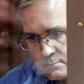 Former US marine Paul Whelan appeared in a glass cage at the court hearing as is usual for suspects in Russia