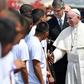 Pope Francis (R) greets young detainees before leaving Las Garzas youth detention centre in Pacora, on the outskirts of Panama City, on January 25, 2019, during his visit to Panama for World Youth Day