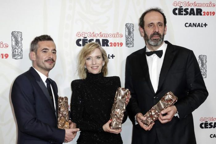 French director Xavier Legrand (L) winner of the Best film award and Best Original Screenplay award with actress Lea Drucker, winner of Best actress award and producer Alexandre Gavras