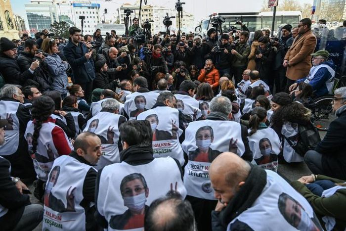 Protesters wore vests bearing images of hunger striking lawmaker Leyla Guven