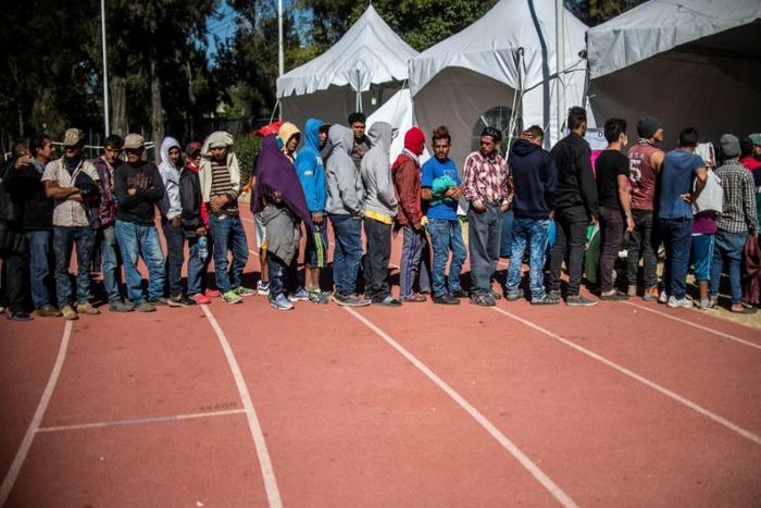 Central American migrants -- mostly Hondurans -- at a shelter in Mexico City on January 30 before heading for the US border