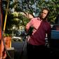A man pumps fuel at a gas station in Caracas, on January 29, 2019