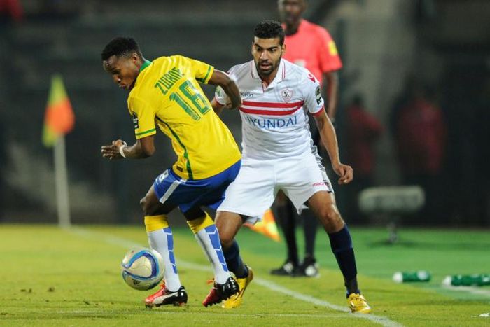 Themba Zwane (L) scored twice to earn Mamelodi Sundowns of South Africa a 2-1 victory over Wydad Casablanca of Morocco Saturday in a CAF Champions League Group A match near Pretoria.