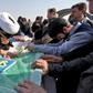 Iranians mourn victims of a suicide bombing on a Revolutionary Guards bus in southeastern Iran, as the coffins arrive at Badr airport in Isfahan, some 400 kilometres south of the capital Tehran on February 14, 2019