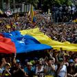 Protesters rally in Caracas in support of Juan Guaido, who the United States says is the legitimate interim president of Venezuela