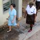 Yang Fenglan (centre), seen here as she entered court at the start of her trial in 2016, has been dubbed the 'Ivory Queen' for her role in trafficking