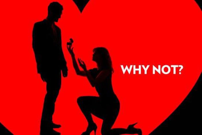 Silhouette of woman proposing to a man