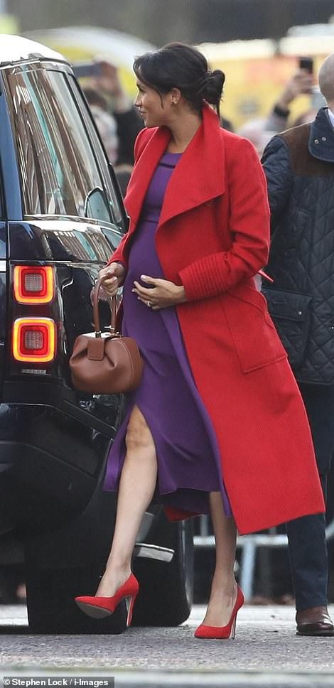 Meghan Markle is the picture of style in a red coat and purple coat
