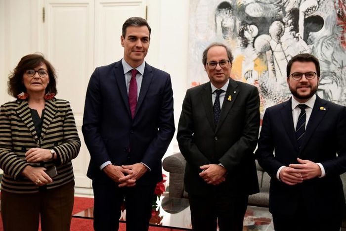 Spanish deputy prime minister Carmen Calvo (L, pictured December 2018 with Prime Minister Pedro Sanchez, 2L) and Catalan vice president Pere Aragones (R) met in Madrid to try to re-build ties broken in an October 2017 secession attempt