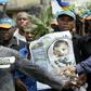 Members of the Ogoni community carrying a poster of Ken Saro-Wiwa marched in Port Harcourt to remember the civil rights activist on the 10th anniversary of his 1995 execution