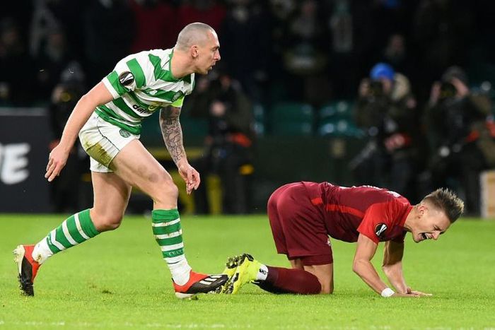 Celtic midfielder Scott Brown (L), pictured in December 2018, scored a last-gasp winner as the Hoops extended their lead at the top of the Scottish Premiership