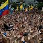 Demonstrators in Caracas rally against Nicolas Maduro, who the United States has declared to be illegimate as the president of Venezuela