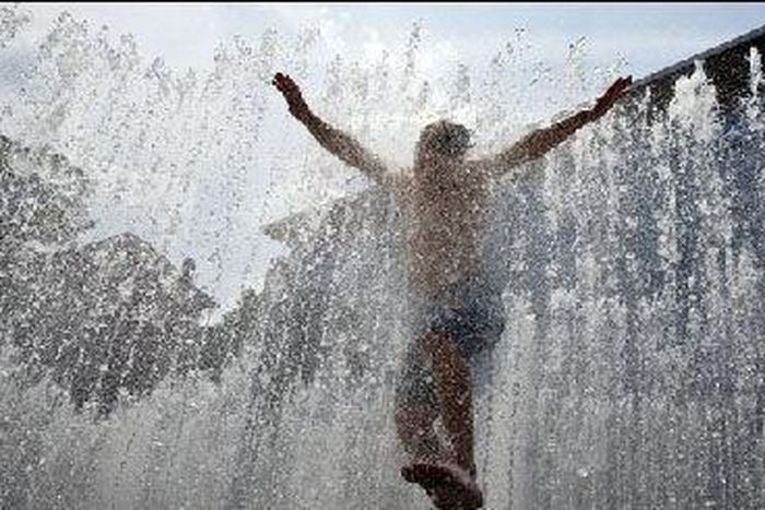 Some Christian worshippers took part in a joint prayer session in the rain as they hope for blessings in the new year. [Tulsa World]