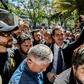 Venezuelan opposition leader Juan Guaido (C), head of the National Assembly and self-declared 'acting president,' is seen in a crowd of supporters after a rally in Caracas on January 25, 2019