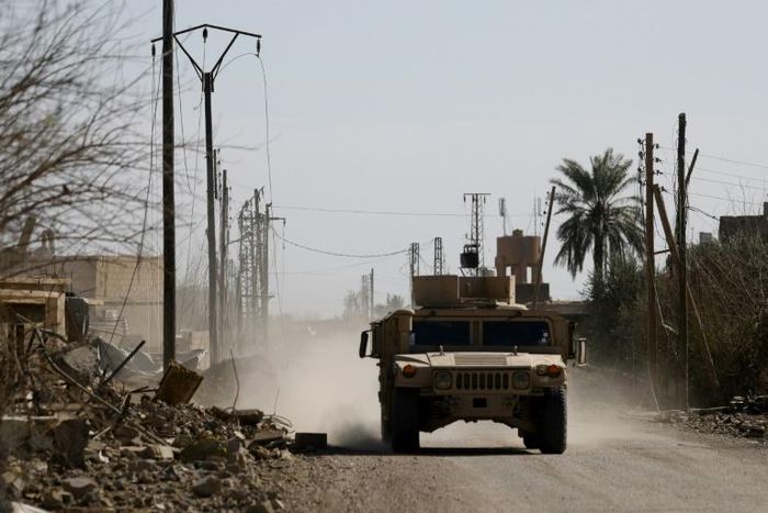 An armoured vehicle belonging to the US-backed Syrian Democratic Forces (SDF) near the front line village of Baghouz in eastern Syria on February 2, 2019