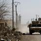 An armoured vehicle belonging to the US-backed Syrian Democratic Forces (SDF) near the front line village of Baghouz in eastern Syria on February 2, 2019