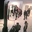 An image grab taken from a video footage released by the Russian Interior Ministry shows a man, stealing a painting by Arkhip Kuindzh at Moscow's Tretyakov Gallery