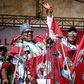 President Muhammadu Buhari (left), Dr Kayode Fayemi (middle) and APC national chairman, Adams Oshiomhole (right) at the APC mega rally in Ekiti, July 10, 2018