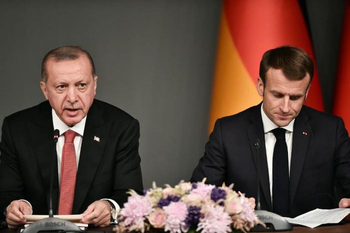Turkish President Recep Tayyip Erdogan (L, pictured October 2018) told French President Emmanuel Macron he was "still a political noice" and should "first learn the history of [his] country"