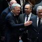 Belgian Foreign Minister Didier Reynders (L) speaks with his Dominican counterpart Miguel Vargas