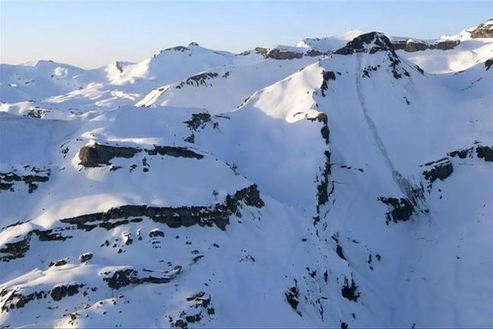 Rescue operations went on after dark with police fearing people could still be trapped under the snow after an avalanche hit the Swiss ski resort of Crans-Montana