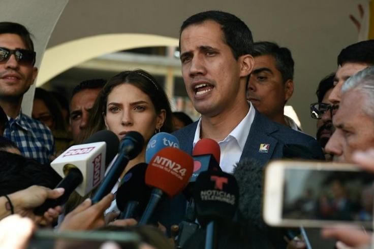 Juan Guaido, Venezuela's National Assembly leader and self-proclaimed acting president, is in a test of wills with President Nicolas Maduro