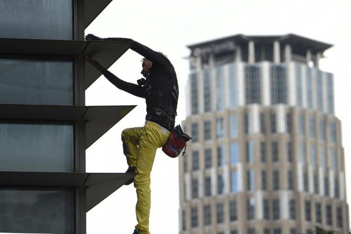 Alain Robert, dubbed the 'French spiderman' climbed the 47-storey GT Tower without safety equipment