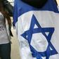 Halimi was tortured for three weeks. The slogan on the woman's T-shirt reads "For you, our brother Ilan"