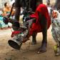 A trailer disrupted the flow of a ritual exercise being performed by the worshippers of the 'ogun' god. [Flickr]