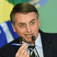 Brazilian President Jair Bolsonaro before signing a decree that makes it easier for adults with no criminal records to buy guns and keep them at home