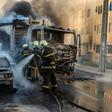 This picture released by O Povo shows firefighters putting out a burning truck and car during a wave of gang violence in Brazil's northeastern Ceara state, in Fortaleza, Ceara state, Brazil on January 3, 2019