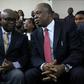 Nigeria's top judge Walter Onnoghen, seen on the left, has been put on trial for failing to disclose assets in what many see as a politically-charged case ahead of the elections