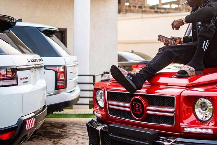 Shatta Wale flexed his garage muscle in pictures showing two angelic Range Rover Sport vehicles. [Instagram/shattawalenima]