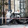 Two men in their twenties were arrested as police and army explosives teams remained at the scene of the blast