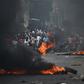 Demonstrators set tire barricades ablaze on the fourth day of protests in Port-au-Prince demanding the resignation of Haitian President Jovenel Moise