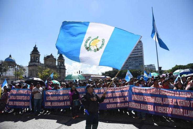 Demonstrators march against Guatemalan President Jimmy Morales in Guatemala City on January 12, 2019