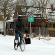Jerry Jackson rides his bike in Detroit, Michigan -- the state has declared a emergency in view of the frigid temperatures