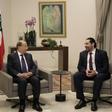 Lebanese President Michel Aoun (L) and Prime Minister Saad Hariri in discussion at the presidential palace, as a new government is formed more than eight months after elections