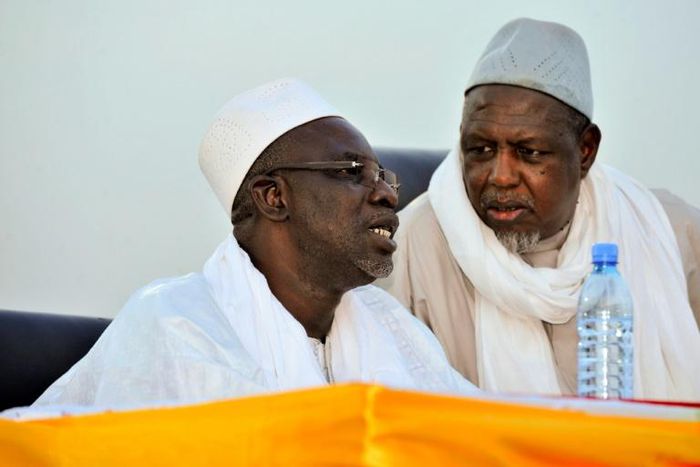 Dicko pictured right in 2015, told the crowd jihadism had no place in Mali