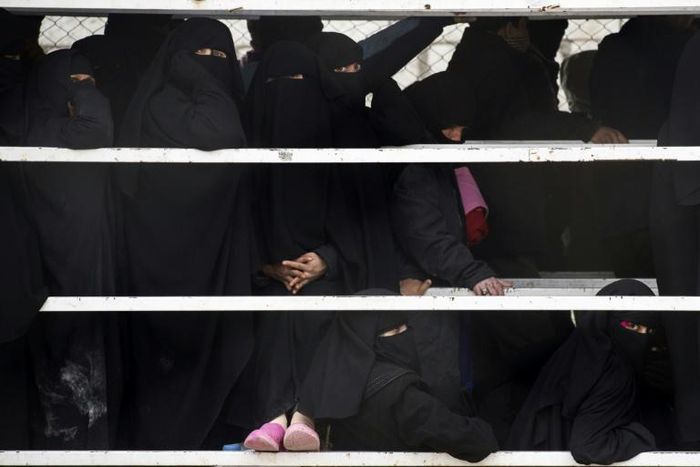 Thousands of haggard women and children have fled the Islamic State's last enclave as the US-backed Syrian Democratic Forces ready a final assault on remaining jihadist diehards, maybe as early as next week