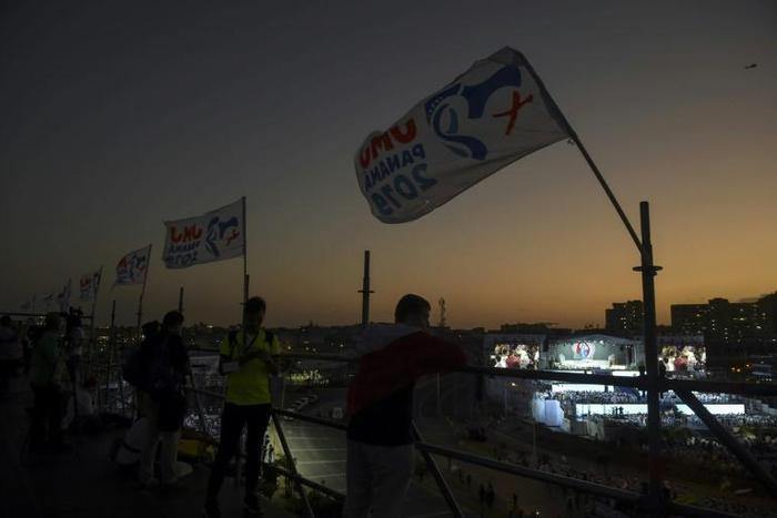 Catholics participate in the opening mass of World Youth Day in Panama City on the eve of the arrival of Pope Francis