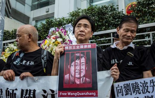 Rights activists have held protests against Wang Quanzhang's detention, including in Hong Kong