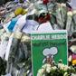 A makeshift tribute outside the Paris offices of the Charlie Hebdo satirical magazine, where 12 people were killed in 2015 in an attack that marked the start of a wave of jihadist attacks in France