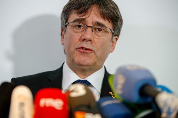 Former Catalan leader Carles Puigdemont says the trial of 12 ex-colleagues over a secession bid is a 'stress test' for Spain's democracy and judiciary