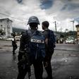 Policemen patrol the market in Buea in the majority English-speaking Southwest Region of Cameroon on October 3, 2018